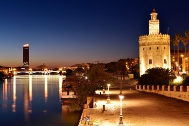 torre de oro (golden tower), a dodecagonal military watchtower in seville, spain