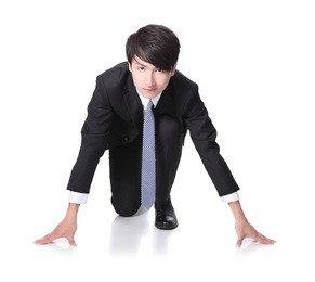 start your business - business man ready to start running in full length isolated over white background, model is a asian man