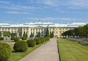 peterhof, russia, king's palace and fountains in park, surroundings of st. petersburg, unidentified people - tourists sight seeing the place.
