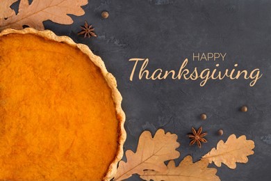 frame from orange pumpkin pie, spices, autumn leaves on concrete dark gray background with text, toned. happy thanksgiving day, culinary, recipe, menu concept. top view, flat lay, copy space, mock up