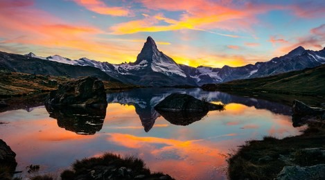exciting morning view of stellisee lake with matterhorn/cervino peak on background. unbelievable autumn scene of swiss alps, zermatt location, switzerland, europe. beauty of nature concept background.