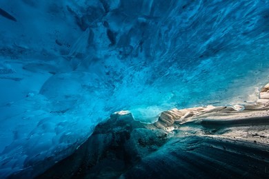 glacier, under a glacier, thawing of a glacier, blue deep color an arch from ice, norway
