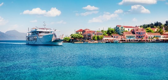 nice  panoramic view of fiskardo port. splendid spring seascape of ionian sea. colorful morning scene of kefalonia island, greece, europe. traveling concept background.