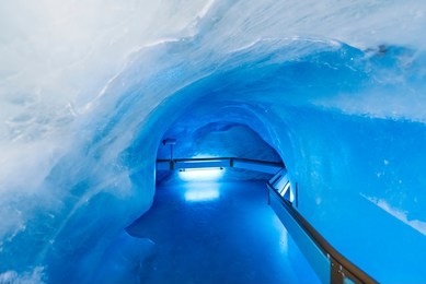 glacier cave tunnel at mount titlis, switzerland. mount titlis is a mountain of the uri alps at 3,238 metres above sea level.