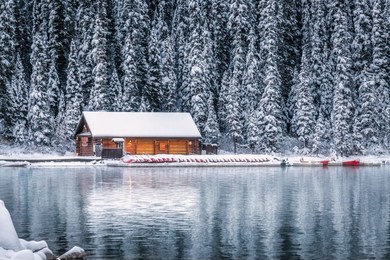 lake louise with mountains reflection at banff national park, canada.