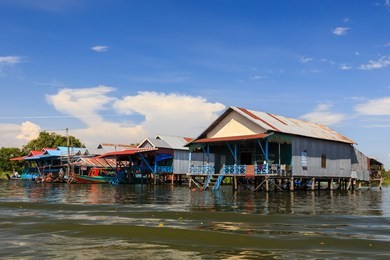 beautiful rural landscape of floating house at kampong phluk floating village within tonle sap, freshwater lake in cambodia and the largest freshwater lake in southeast asia
