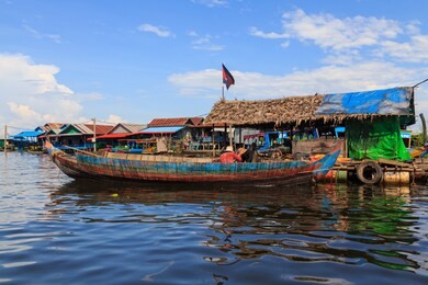 beautiful rural landscape view of local fresh water village tonle sap lake, siem reap, cambodia with clear blue sky