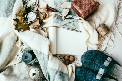 autumn and winter composition
paper blank autumn fall concept flat lay top view copy space 
homewear and home decor