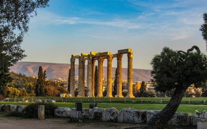temple of olympian zeus in athens during golden hour, sunset in athens, greece