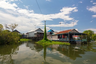 beautiful rural landscape of floating house at kampong phluk floating village within tonle sap, freshwater lake in cambodia and the largest freshwater lake in southeast asia
