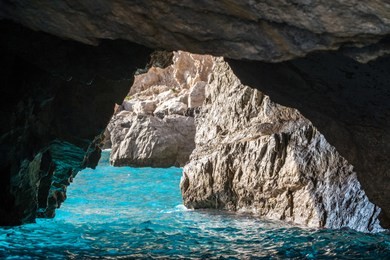 the green grotto (also known as the emerald grotto), grotta verde, on the coast of the island of capri in the bay of naples, italy.