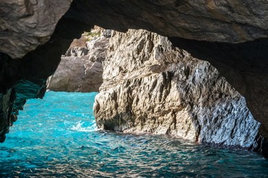 the green grotto (also known as the emerald grotto), grotta verde, on the coast of the island of capri in the bay of naples, italy.