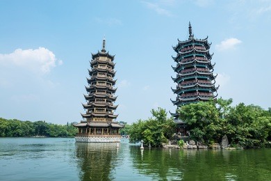 banyan lake pagodas, guilin, china ,one represents the sun, the other the moon