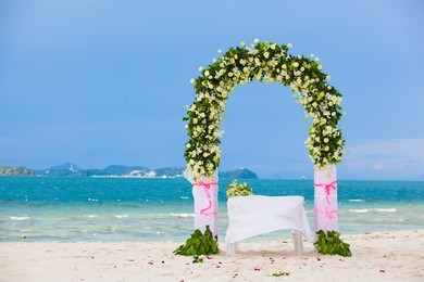 wedding archway at tropical beach