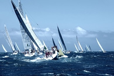 sailboats yachts under sail with spinnakers at the regatta. sailing yacht race. yachting