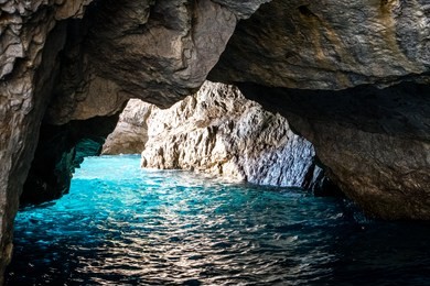 the green grotto (also known as the emerald grotto), grotta verde, on the coast of the island of capri in the bay of naples, italy.