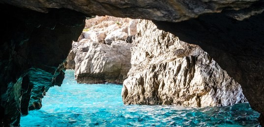 the green grotto (also known as the emerald grotto), grotta verde, on the coast of the island of capri in the bay of naples, italy.