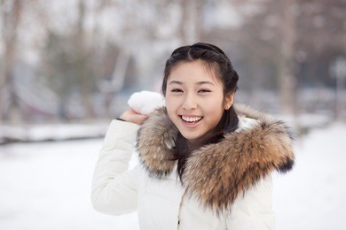 a beautiful asian girl, in winter outdoor
