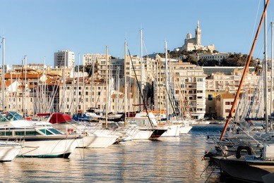 view of marseille's vieux port and notre dame de la garde church, france