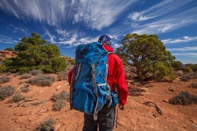 hiker in canyonlands national park in utah, usa
