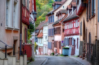 autumn afternoon in weinheim, germany. classic country lane with half-timbered houses