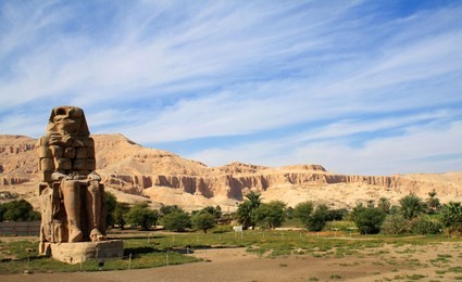 egypt. luxor. the colossi of memnon - massive stone statues of pharaoh amenhotep iii