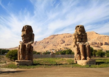 egypt. luxor. the colossi of memnon - two massive stone statues of pharaoh amenhotep iii