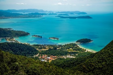 close-up of blue sky, sea and mountain view from cable car viewpoint, langkawi island, malaysia. landscape with tropical forest, beaches, small islands in seas of strait of malacca