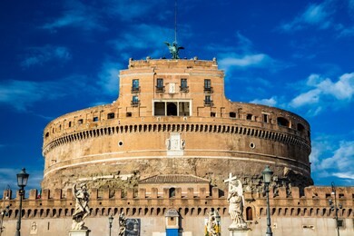 the mausoleum of roman emperor hadrian, usually known as castel sant'angelo, with the eponymous bridge and the river tiber, in rome, near the vatican. it was used by the popes as a fortress and castle