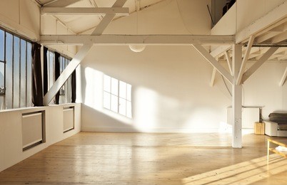 wide open space, beams and wooden floor