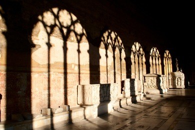shadows on the wall. camposanto building in pisa, italy