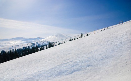 winter ski resort snow mountains landscape with blue sky in summer sunny day