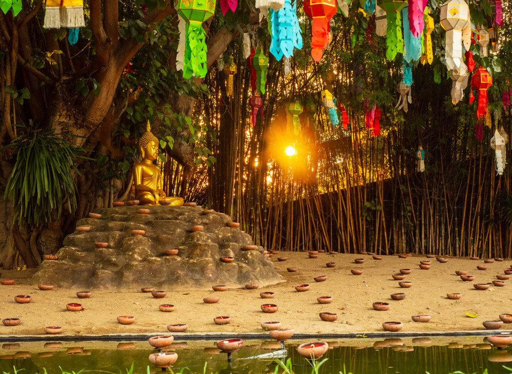 wat phan tao temple loy krathong festival in chiangmai.traditional monk lights floating balloon made of paper annually 