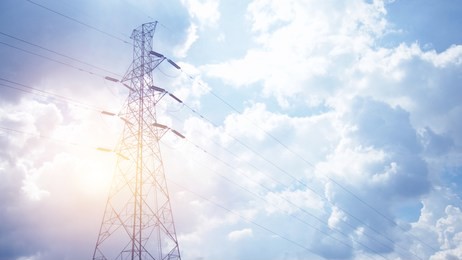 high voltage tower lines station for energy concept background and banner with copy space.