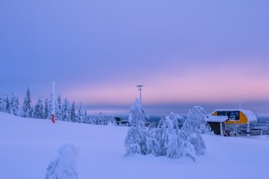 winter finland. polar day. ski lift station on top of the mountain. a lot of snow