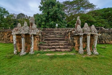 terrace of the leper king in angkor thom complex at sunrise, archaeological park in siem reap, cambodia unesco world heritage site