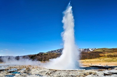 eruption of strokkur geyser in iceland