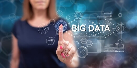 woman touching a big data concept on a touch screen with her finger