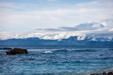 view of gunung agung volcano on bali from mushroom bay, nusa lembongan, indonesia
