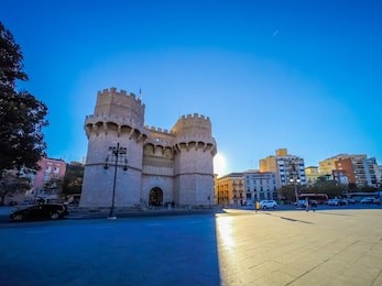 a photo of the medieval architecture of the exterior facade of the popular torres de serranos, which was one of the gates of the ancient of the city wall, christian wall, of valencia, in spain, europe