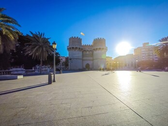 a photo of the medieval architecture of the exterior facade of the popular torres de serranos, which was one of the gates of the ancient of the city wall, christian wall, of valencia, in spain, europe