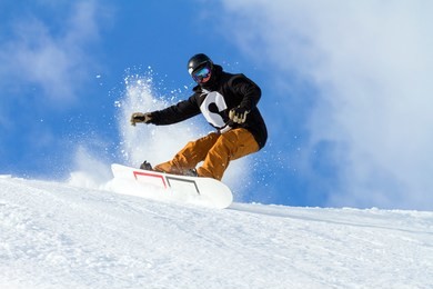 
snowboarder in fresh snow