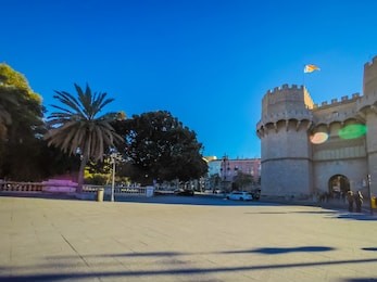 a photo of the medieval architecture of the exterior facade of the popular torres de serranos, which was one of the gates of the ancient of the city wall, christian wall, of valencia, in spain, europe