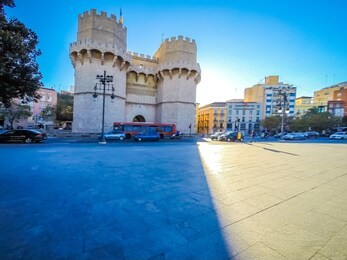 a photo of the medieval architecture of the exterior facade of the popular torres de serranos, which was one of the gates of the ancient of the city wall, christian wall, of valencia, in spain, europe