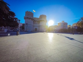 a photo of the medieval architecture of the exterior facade of the popular torres de serranos, which was one of the gates of the ancient of the city wall, christian wall, of valencia, in spain, europe
