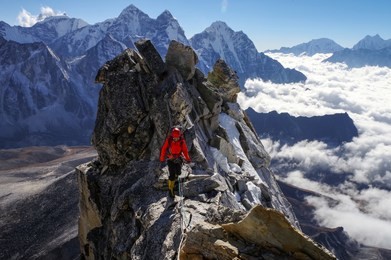 mountaineer on the way to the top of ama dablam mountain, everest region, himalayas, nepal