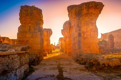 colorful sunset in carthage. baths of antonius in carthage, near tunis, tunisia