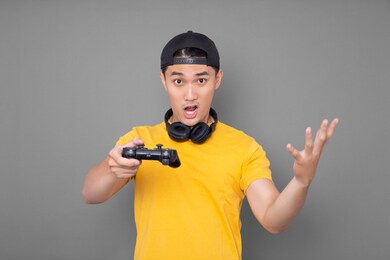 asian man is playing the game