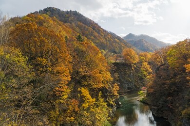 jozankei onsen is located inside shikotsu-toya national park between the high cliffs of the toyohira river. the town is only one hour outside central sapporo.