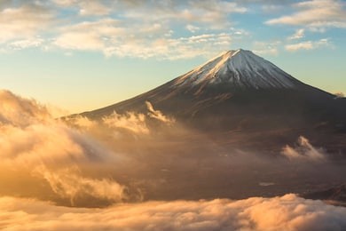 mount fuji and fog at sunrise at lake kawaguchi in autumn,yamanashi,japan.fujisan located on honshu island, is the highest mountain in japan.
